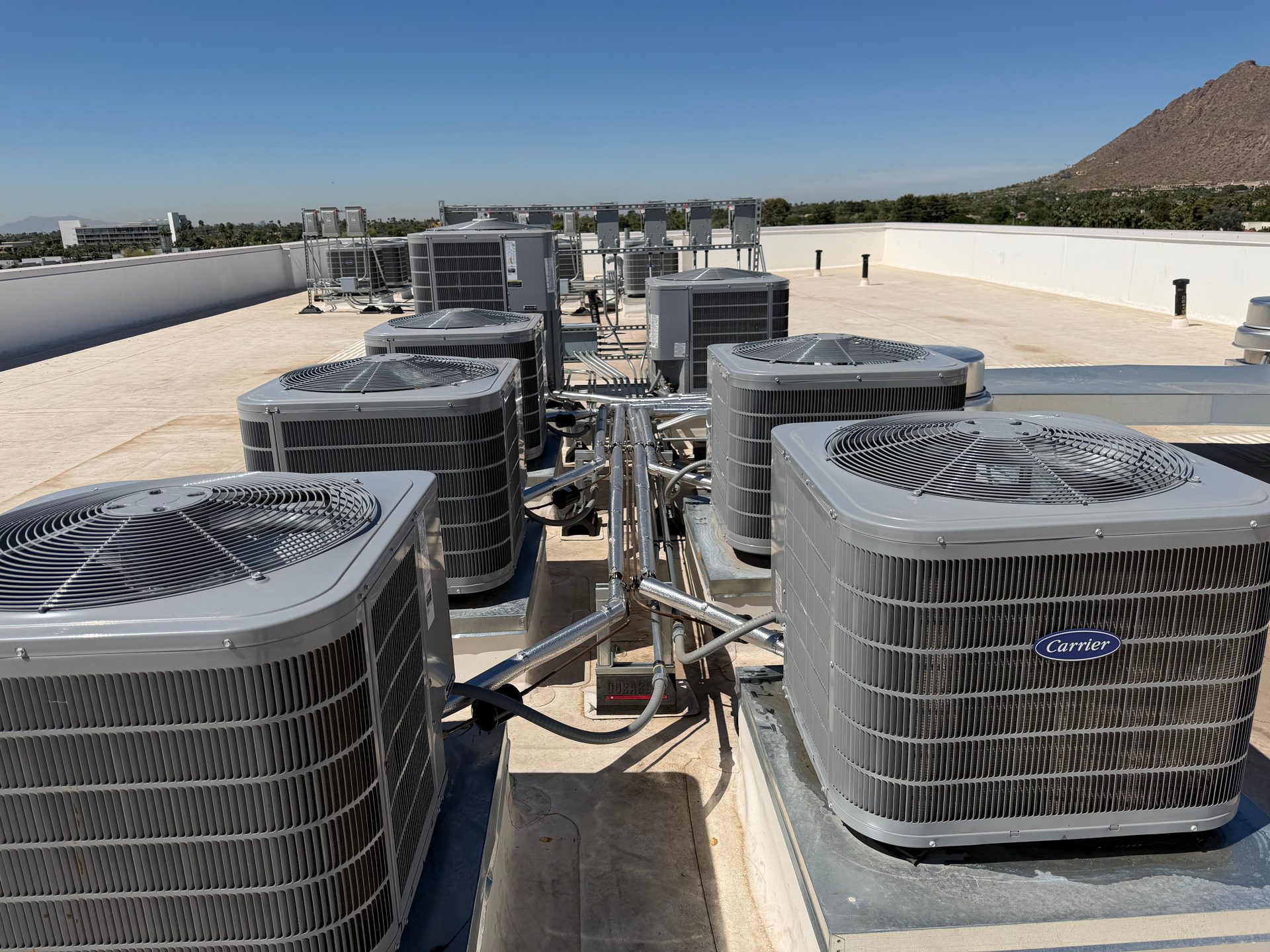 Rooftop AC condenser installation