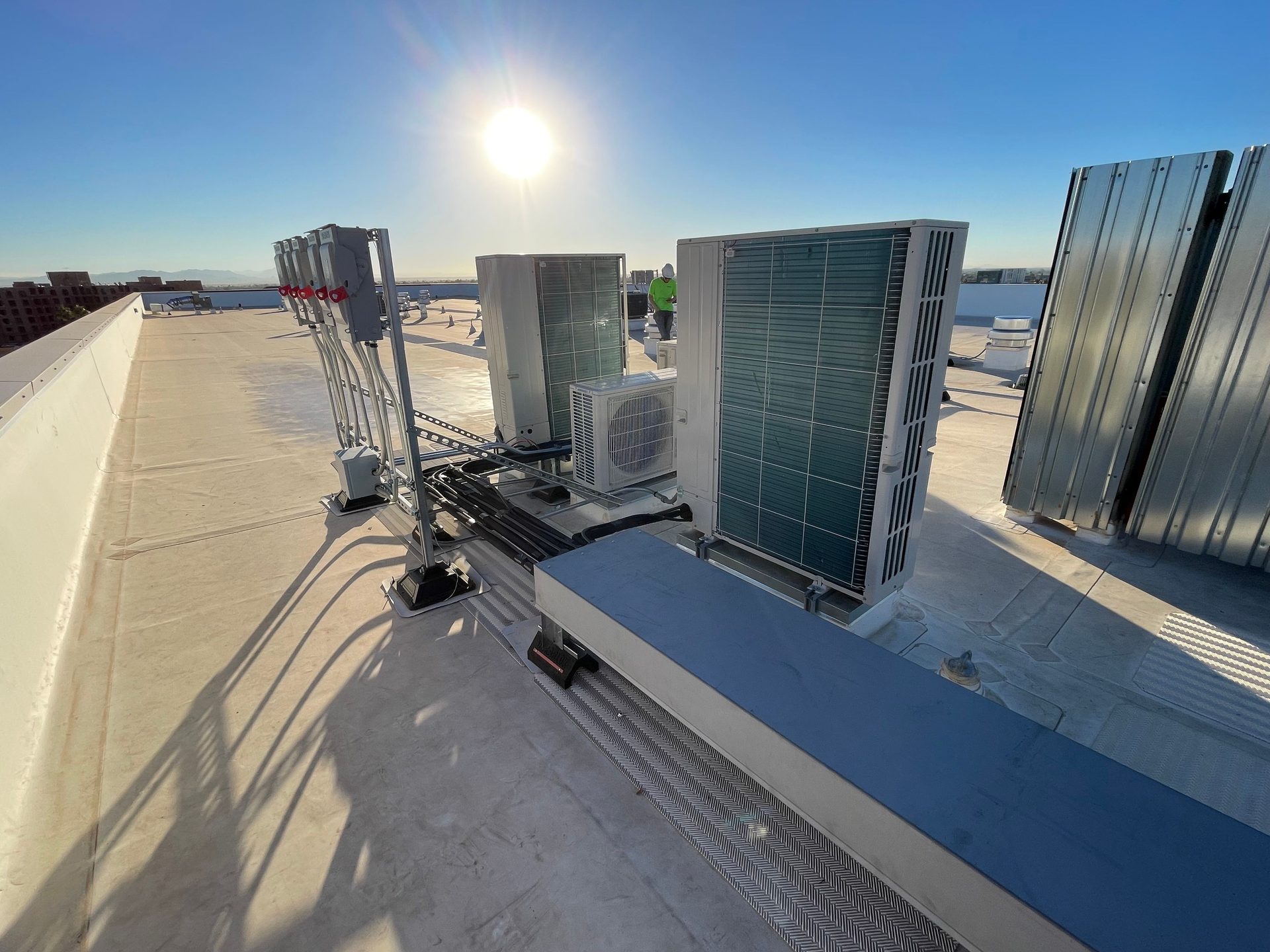 Air-Zona technician on a rooftop installation